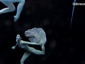 2 girls swim and get bare stunning